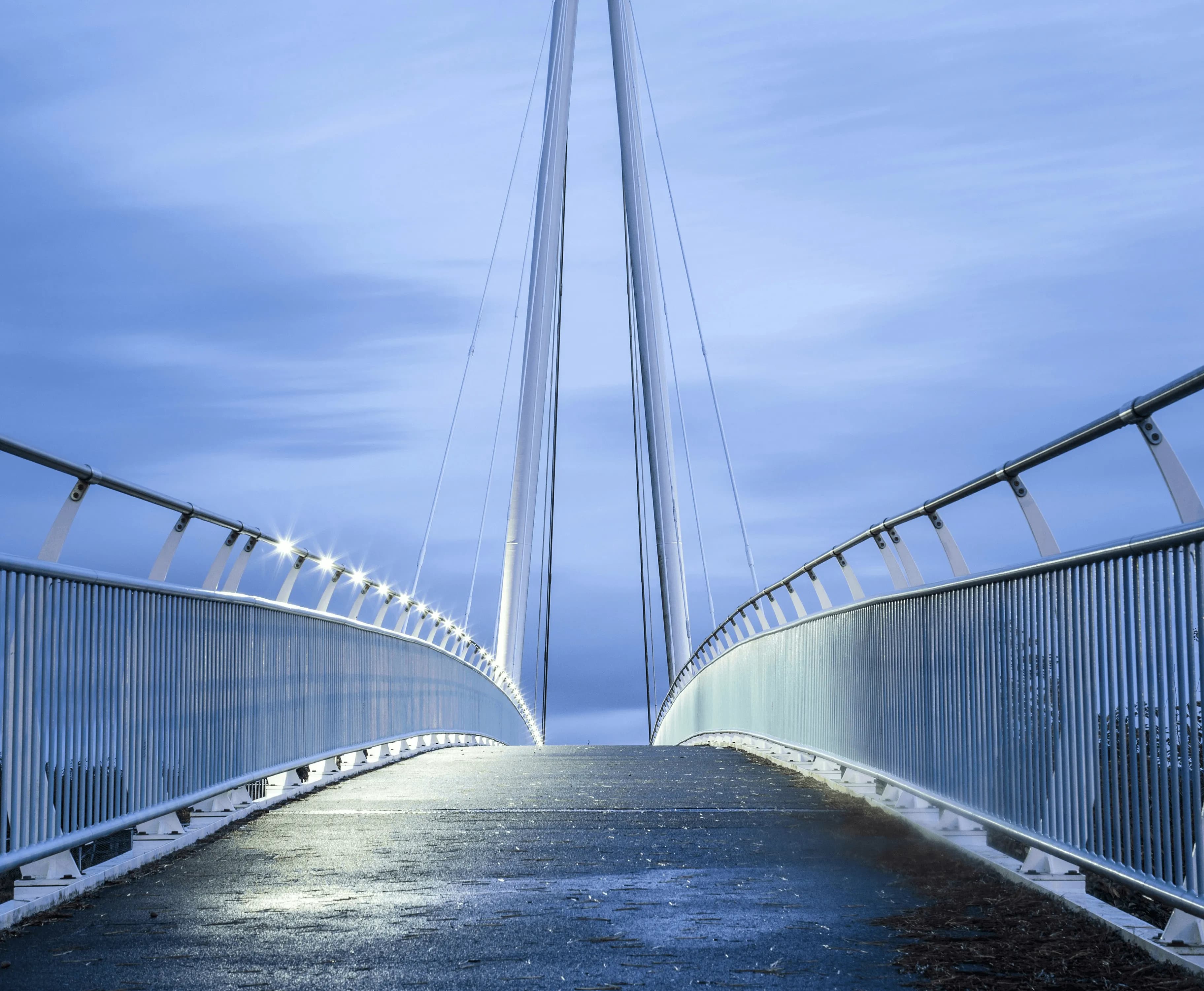 Photo of a bridge. Credit Luke Besley, Unsplash.