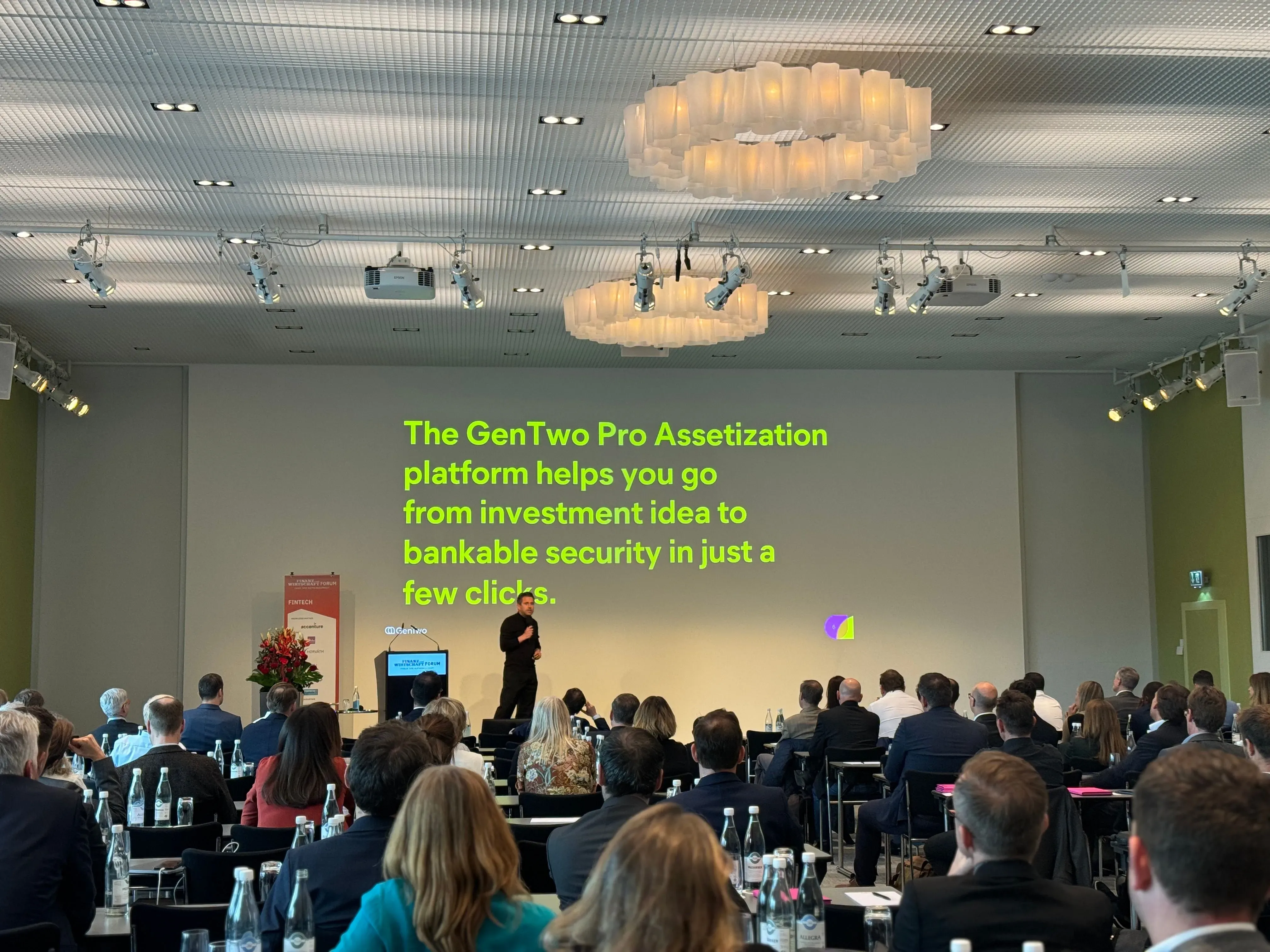 Philippe A. Naegeli presenting GenTwo Pro on stage at the Swiss FinTech Awards